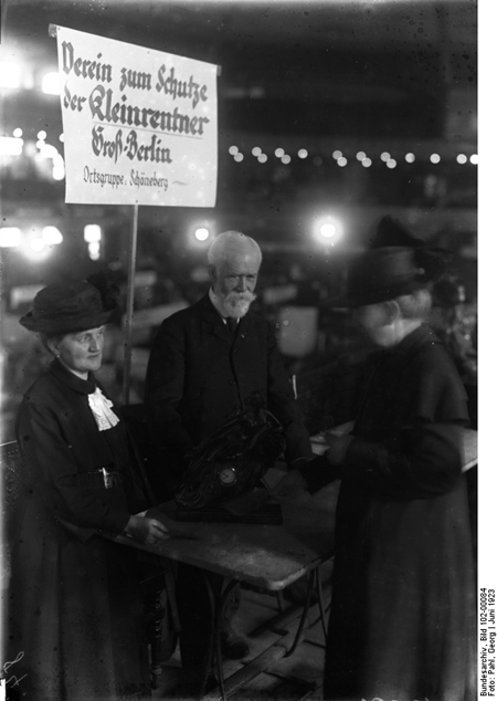 Economically Distressed Middle-Class Pensioners Sell Family Heirlooms at an Exhbition in the <I>Sportpalast</i> in Berlin (1923)